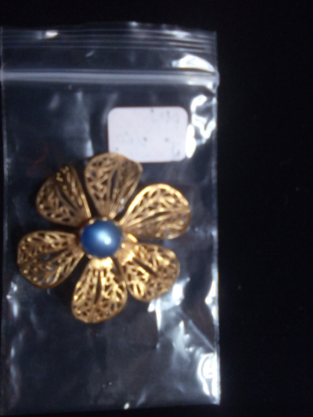 Gold tone vintage flower brooch